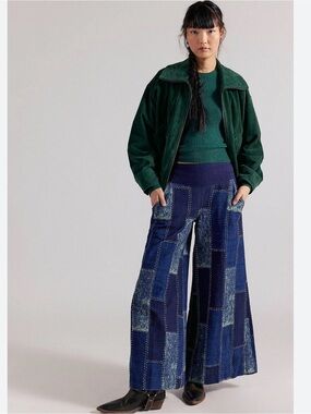 NWT FREE PEOPLE WE TJE FREE PATCHES WIDE LEG FLARE JEANS